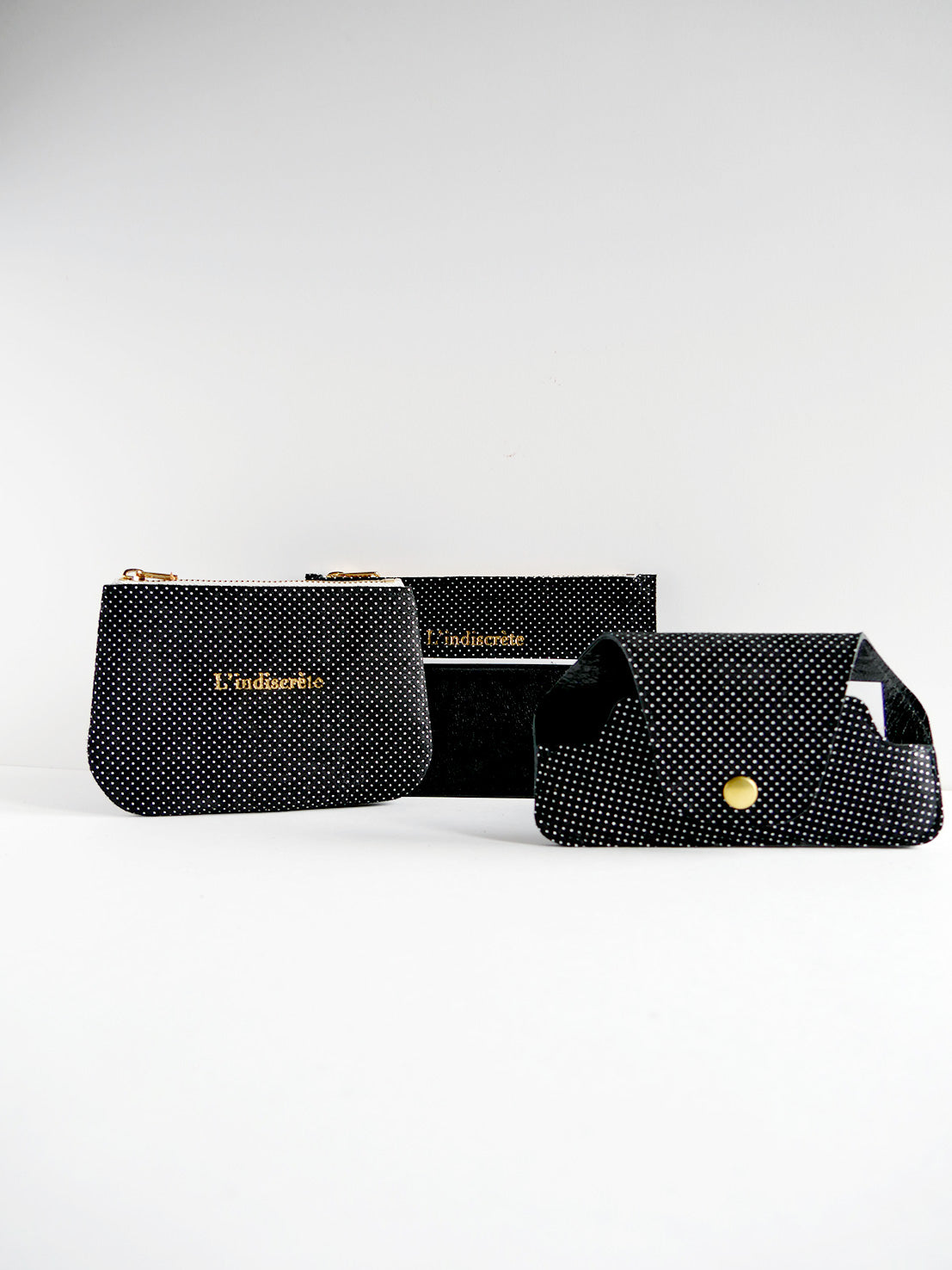 Pochette en cuir noir à pois- P136