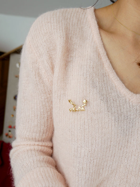 Broche montagne étoilée dorée