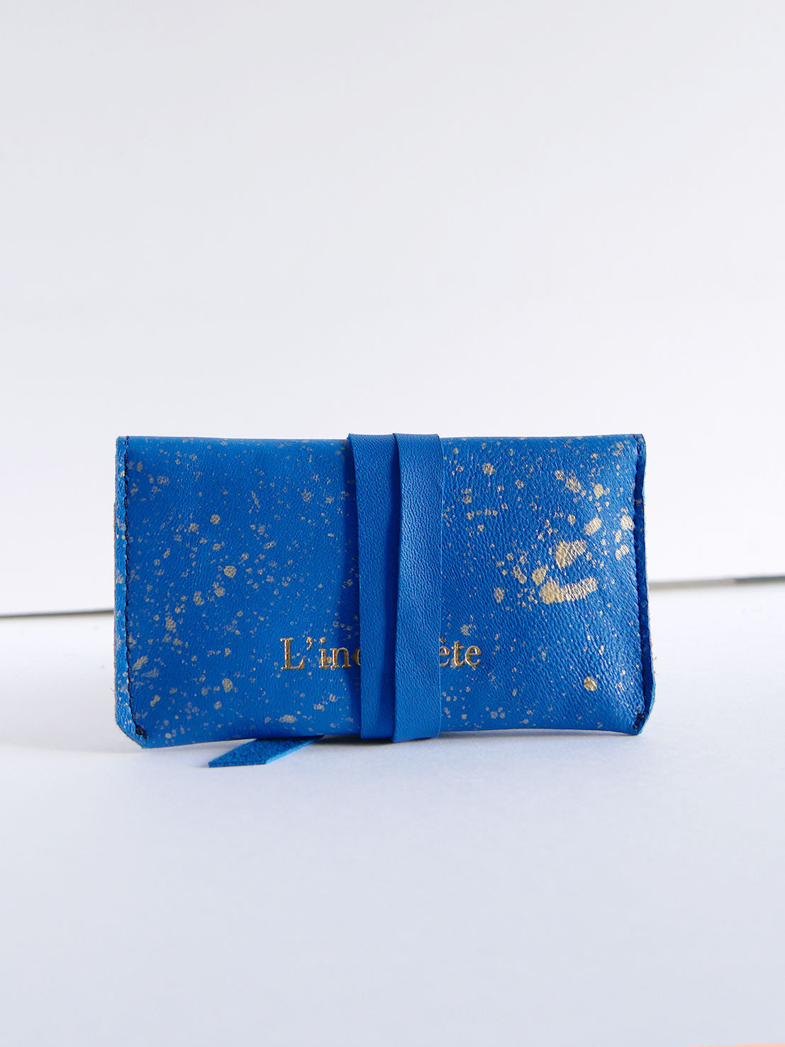 Etui pour bijoux cuir bleu moucheté or