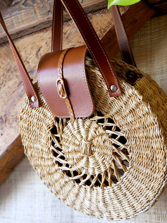 Numéro 54 - Panier en osier rond et cuir camel à anses