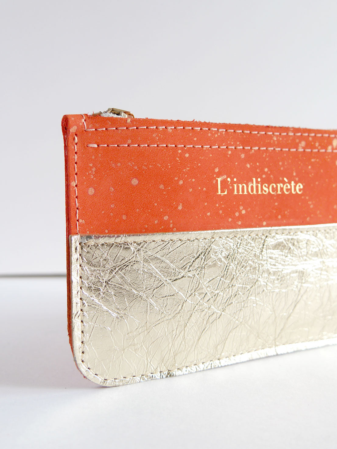 Pochette en cuir orange et or - P114