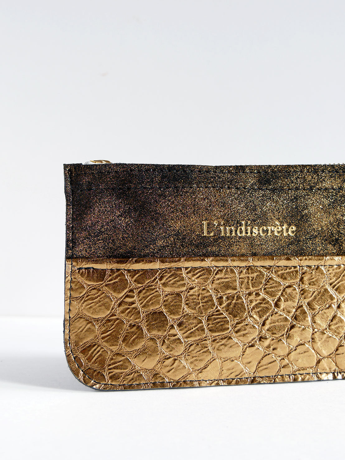 Pochette en cuir noir pailleté et bronze- P139