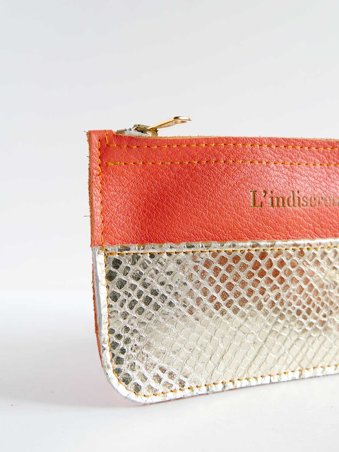 Pochette en cuir orange et or - P69