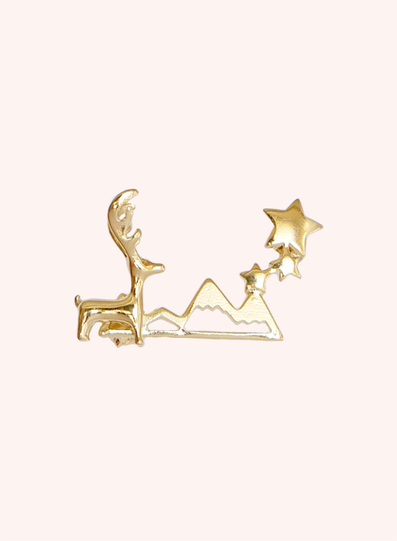 Broche montagne étoilée dorée
