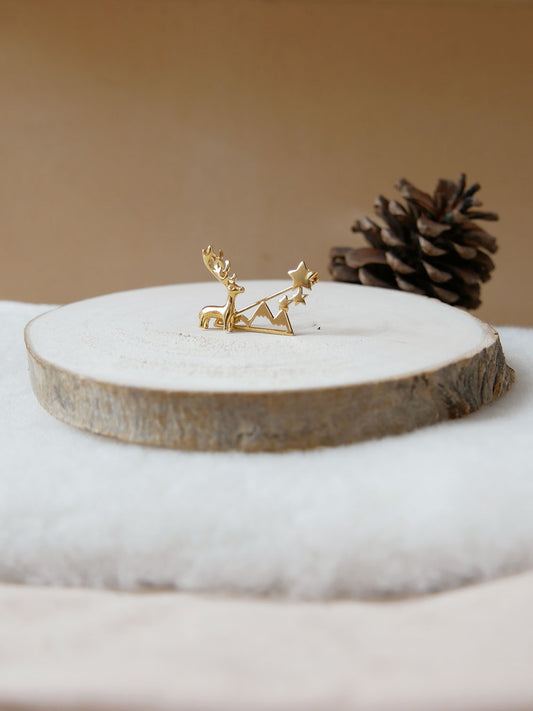 Broche montagne étoilée dorée