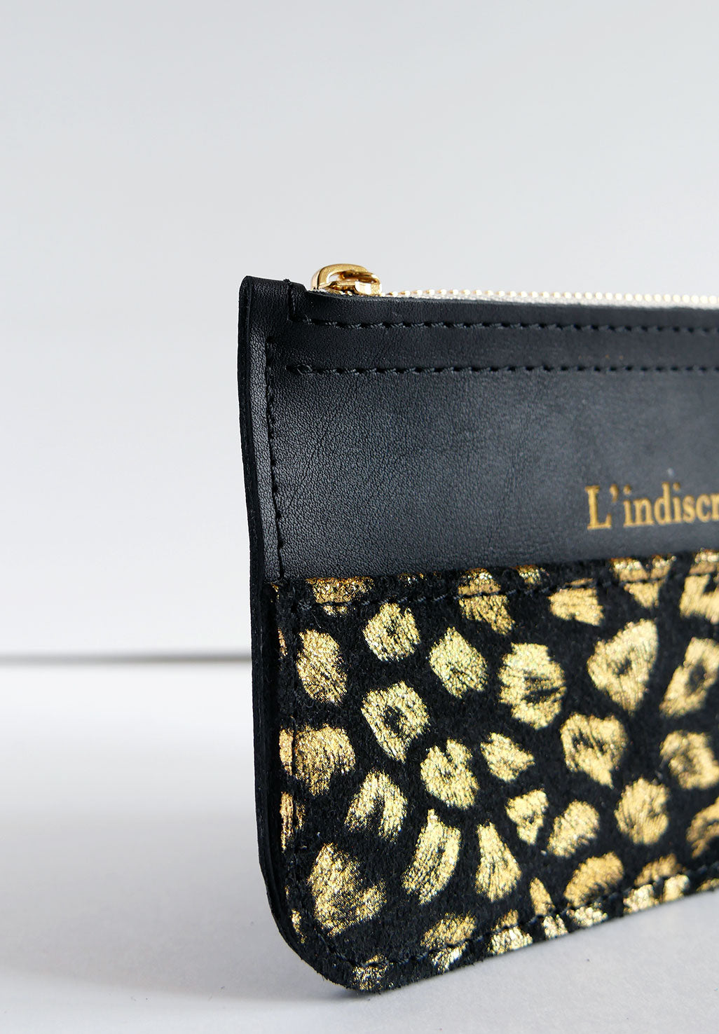 Pochette en cuir noir leopard doré  PO38