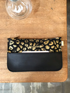 Pochette en cuir leopard doré et cuir noir